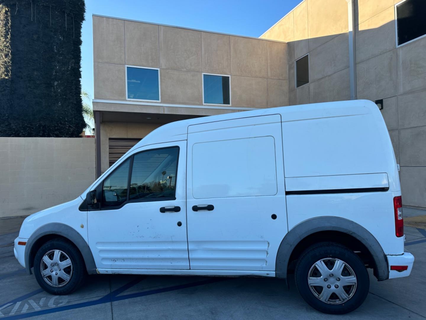 2012 White /Black Ford Transit Connect XLT with Rear Door Glass (NM0LS7BN0CT) with an 2.0L L4 DOHC 16V engine, 4-Speed Automatic transmission, located at 30 S. Berkeley Avenue, Pasadena, CA, 91107, (626) 248-7567, 34.145447, -118.109398 - Great price point for a work van. - Photo#1